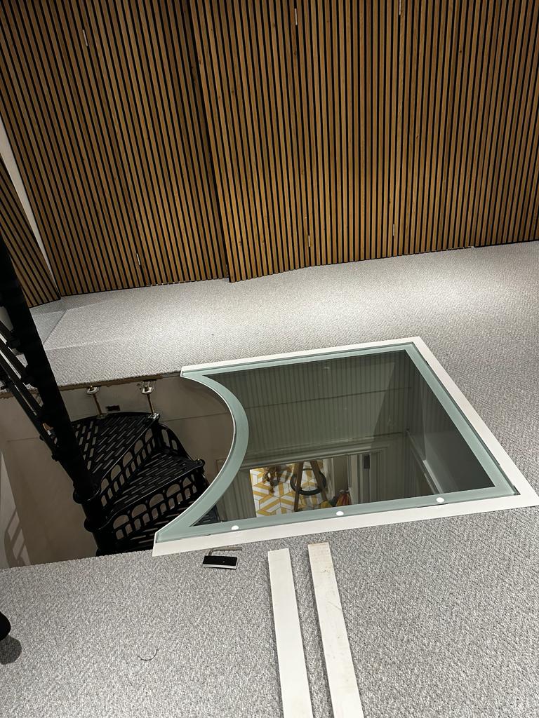 custom shaped walk on floor glass panel and steel frame