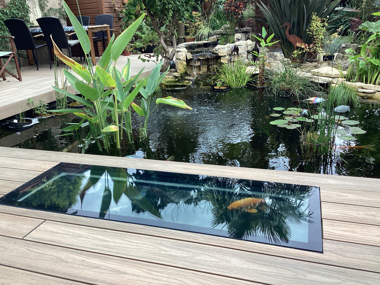 glass floor panel over fish pond external