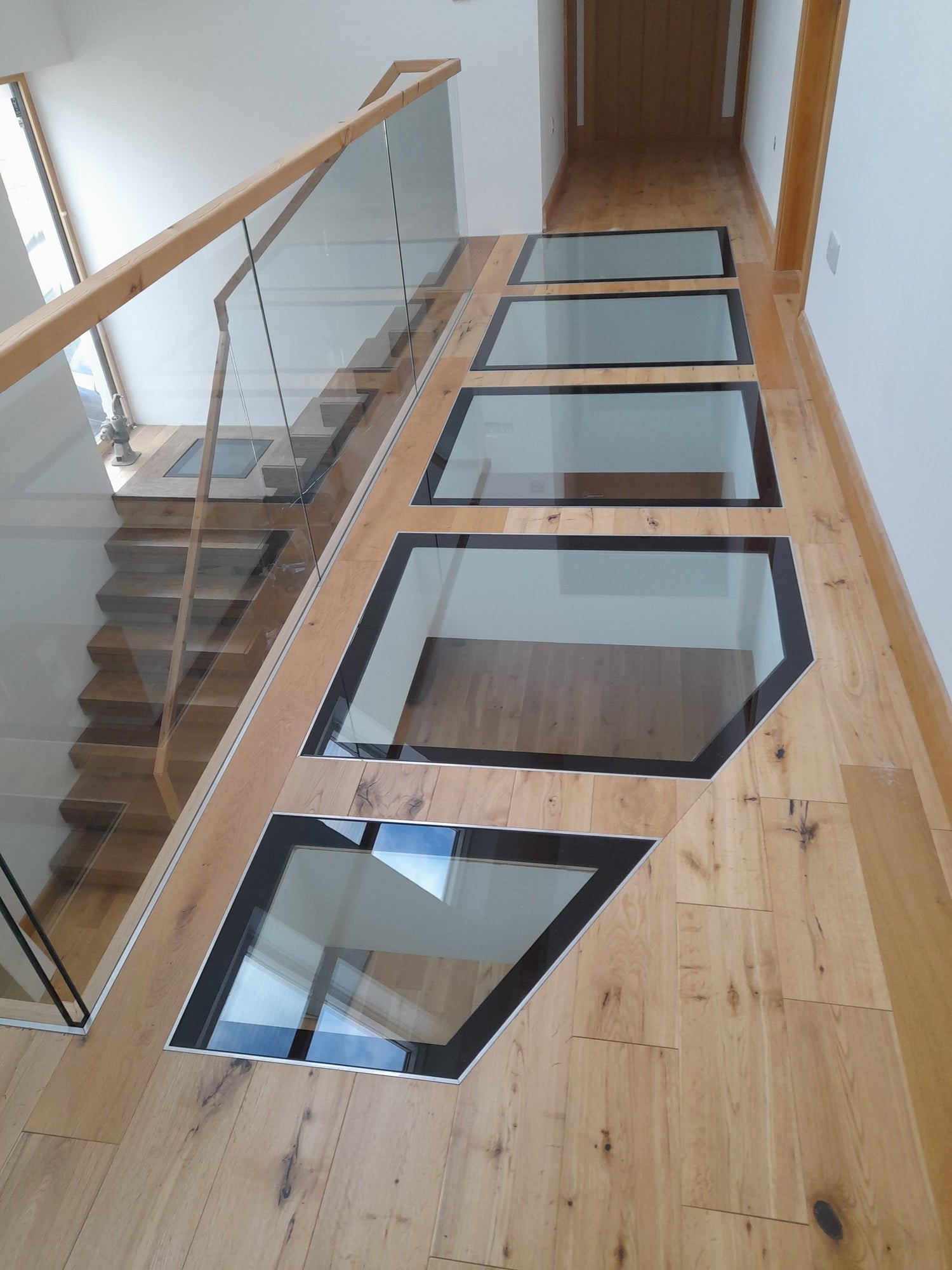custom walk on glass floor panels black trim